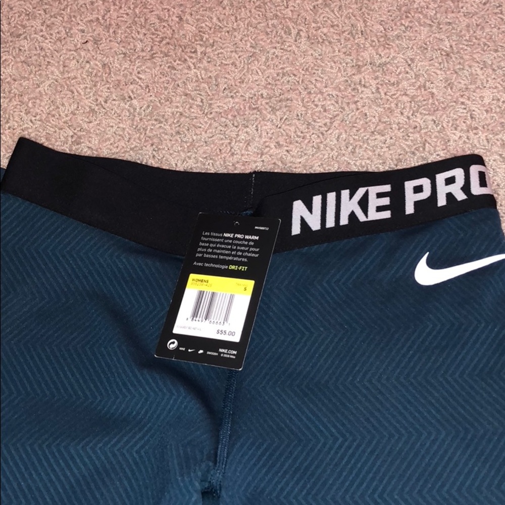 NWT Nike turquoise leggings